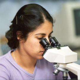 Student at Microscope