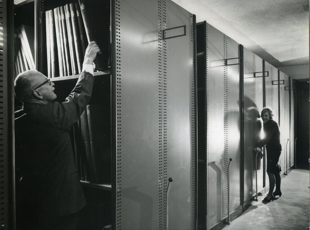 Opening of the Library - Publicity Brochure. Library compactus - stacks