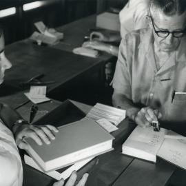 Opening of the Library - Publicity Brochure. Loans desk