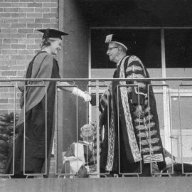 The Chancellor W.C. Wurth Shaking Hands With Helen Maguire
