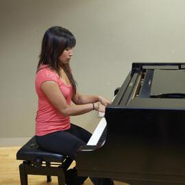 Student with Steinway Piano