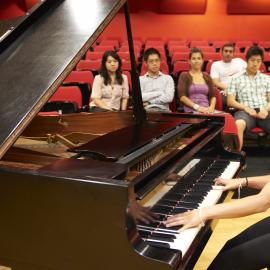 Students with Steinway Piano