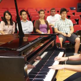 Students with Steinway Piano