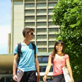 Students on Library Lawn with Library Building behind