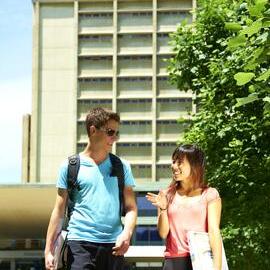 Students on Library Lawn with Library Building behind