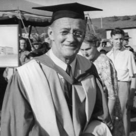 Lord Nuffield in the foreground standing 