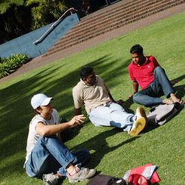 Students on Michael Birt Gardens Lawn in front of Biological Sciences Building