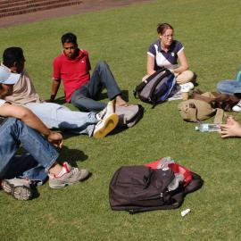 Students on Michael Birt Gardens Lawn in front of Biological Sciences Building