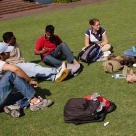 Students on Michael Birt Gardens Lawn in front of Biological Sciences Building