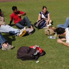 Students on Michael Birt Gardens Lawn in front of Biological Sciences Building
