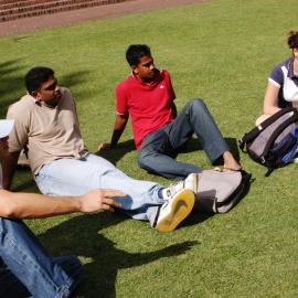 Students on Michael Birt Gardens Lawn in front of Biological Sciences Building