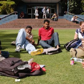 Students on Michael Birt Gardens Lawn in front of Biological Sciences Building